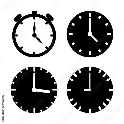 Four stylish analog clock designs in black and white - Minimalist black and white analog clocks with different styles and hands, perfect for modern designs and digital projects.