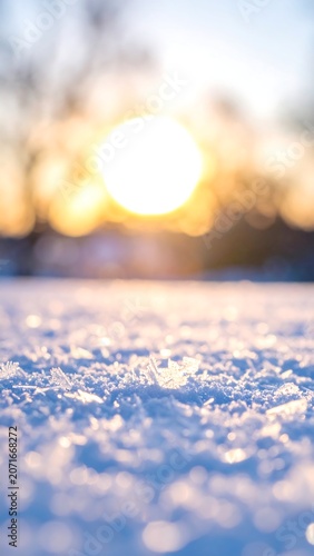 Sunlit snow sparkles at dawn, soft focus background