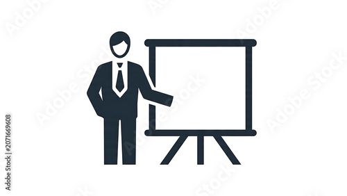 Business professional sitting at minimalist desk with laptop.
