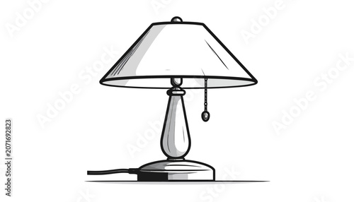 Foto A classic table lamp with shade.