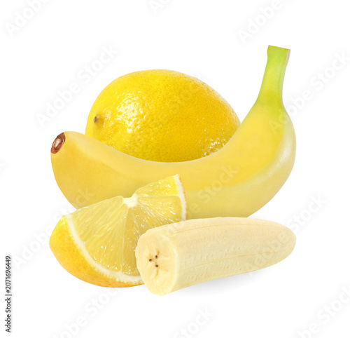 whole, cut banana and lemon isolated on white background with clipping path