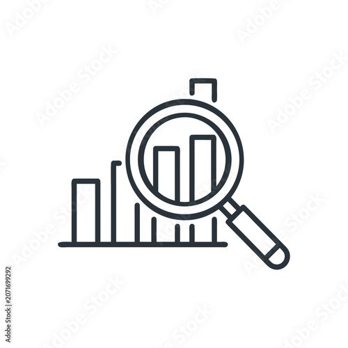 magnifying glass on a newspaper