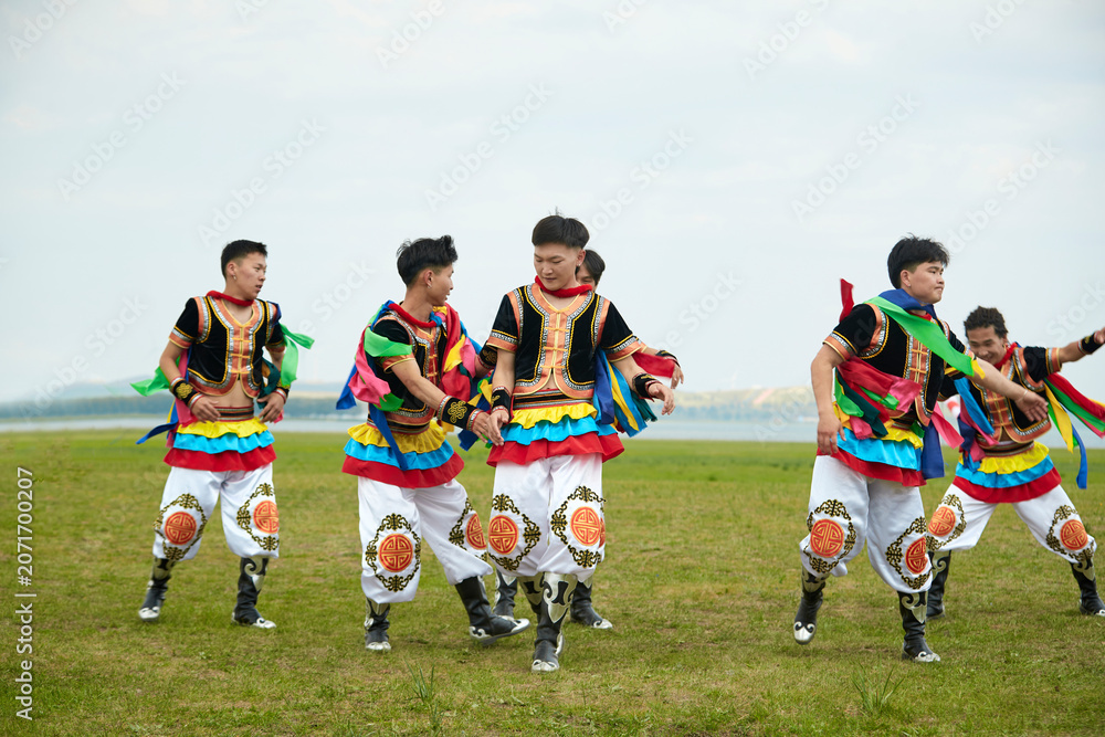 Fototapeta premium Mongolian wrestlers at the Naadam Festival on the grasslands