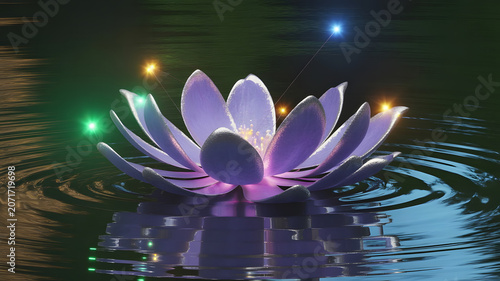 A magic purple flower with colorful lights on water. A lotus flower in the pond