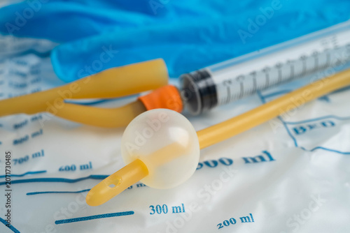 Foto Foley catheter and urine drainage bag collect urine for disability or patient in hospital