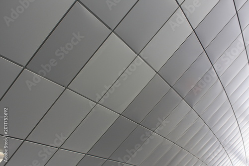 Tableau sur toile Modern ceiling design features sleek geometric panels with subtle lighting and c