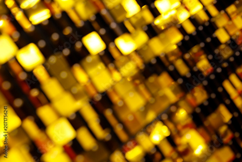Blurred shimmer wall background with shiny golden sequins for luxury party decoration