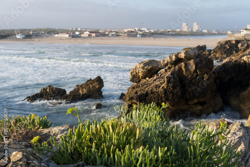 Beach and rocky outcrop in the early morning.