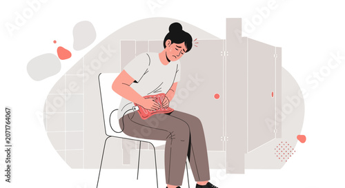 Woman Experiencing Pain While Sitting In A Restroom Holding A Hot Pack.