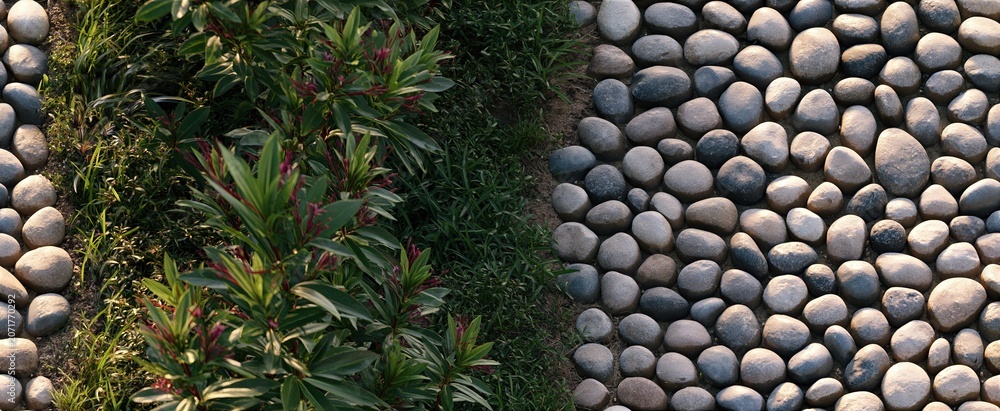 Fototapeta premium A neatly arranged pebble pathway captured from above, showcasing a balanced layout in a serene outdoor space.