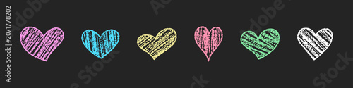 Mixed colorful chalk hearts with textured scribbles on black.