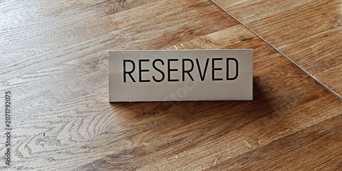 Canvas-taulu Reserved sign on a wooden surface, showing the concept of exclusive access, priv
