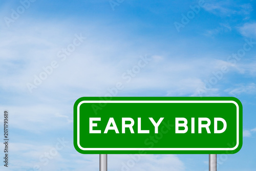 Green color transportation sign with word early bird on blue sky with white cloud background