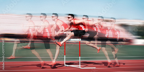 Schilderij op canvas Male hurdler jumping over track barrier in motion sequence