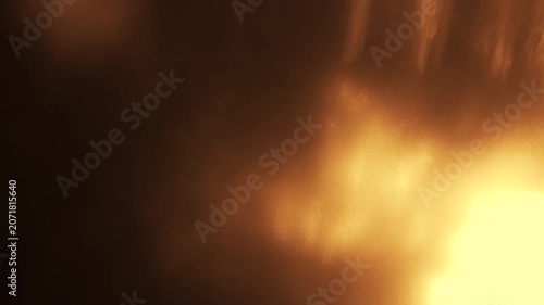 Warm cinematic golden light leak lens flare bokeh transition overlay