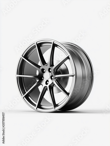 Modern silver alloy car rim isolated on a clean white background.