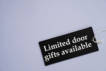Printed black card Limited door gifts available. Management concept. Early bird gift. Blank background for text. Writing and photo background. For multiple uses. Multipurpose