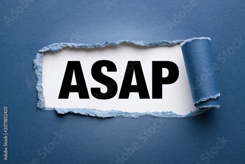 ASAP concept written under torn blue paper