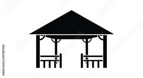 Simple wooden pavilion with picnic benches
