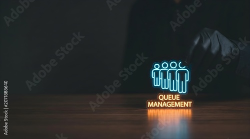 Business professional managing customer queue with neon sign concept on wooden office table