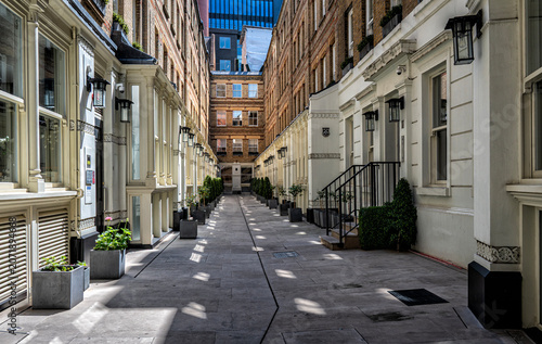 Photography Dyer's Buildings in Holborn, London, a quiet, gated street known for its historic Victorian architecture and central location now known as Pinks Mews