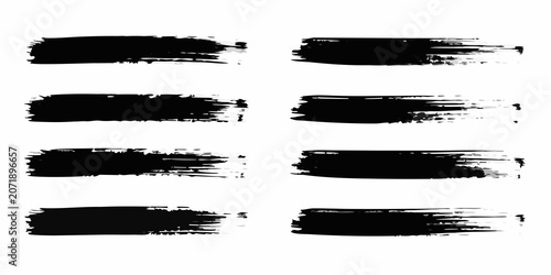 Canvas Print Nine black dry brush strokes on a white background artistic textures and varied