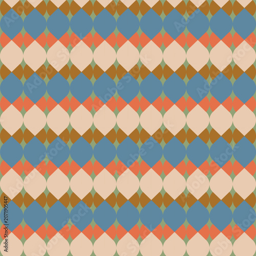 Foto Interlocking ogee and teardrop tile seamless repeated pattern in a dense all-over grid