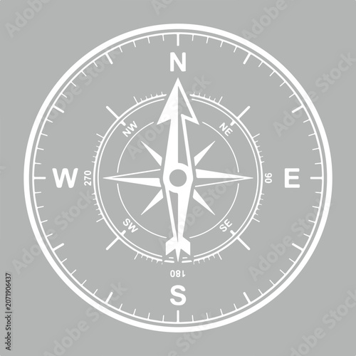 Minimalist white compass rose icon isolated on grey background.