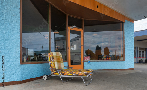 Vintage style shop with sunbed in front at Riverton New Zealand. Village in rural South Island
