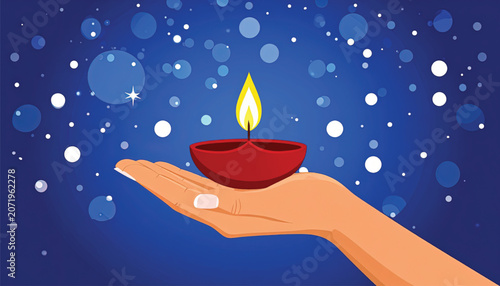 Hand holding lit diya lamp.