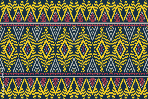 Colorful seamless tribal geometric pattern featuring diamond motifs, ethnic ornaments, and folk textile style background.