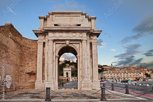 Ancona, Marche, Italy: the ancient triumphal arches Clementino and Trajan in the port of the city and on background the medieval catherdral