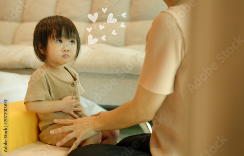 Cute Toddler Looking at Parent with Love and Trust During Gentle Bonding Time at Home.