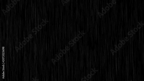Heavy rain looping over black background.Falling raindrops footage animation in slow motion on black background.4K loopable high-speed footage.