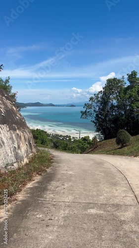 Transport traffic on road with seaview on background