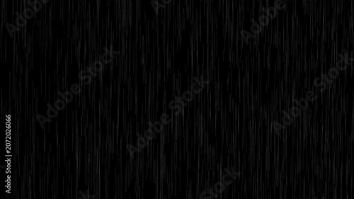Heavy rain looping over black background.Falling raindrops footage animation in slow motion on black background.4K loopable high-speed footage.