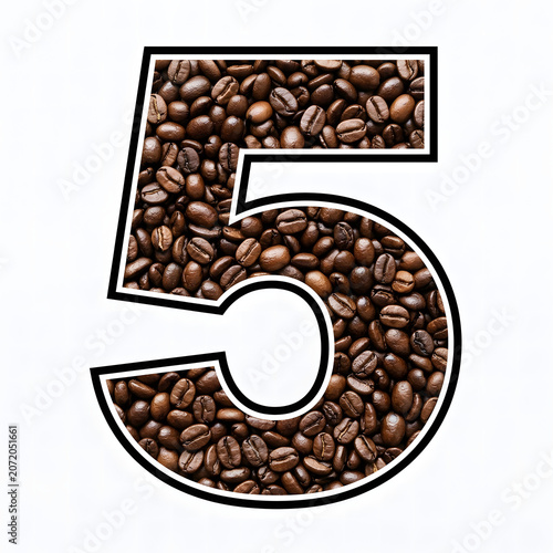 Large number five filled with dark roasted coffee beans on a clean and bright background