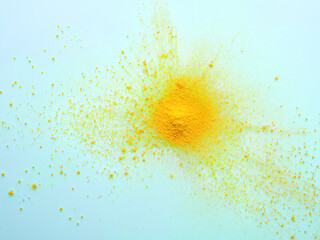 Yellow powder on a light blue background 