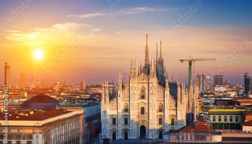 cityscape image of milan italy with milan cathedral during sunrise