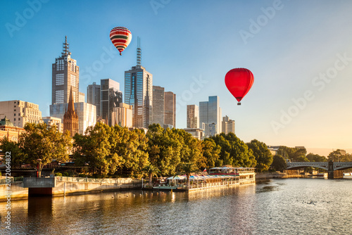 Sunrise over Melbourne with Balloons above the City