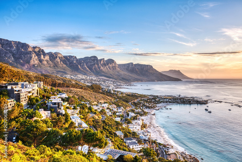 Cape Town Sunset over Camps Bay Beach with Table Mountain and Twelve Apostles in the Background