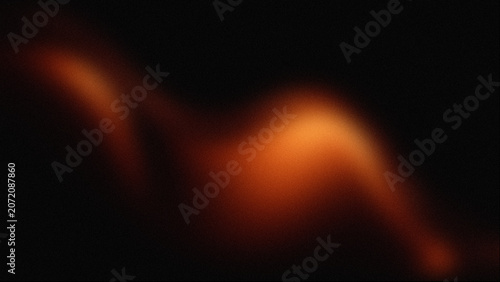 Abstract orange light leak on black background, glowing warm blur effect, soft amber wave texture for cinematic overlays and creative design