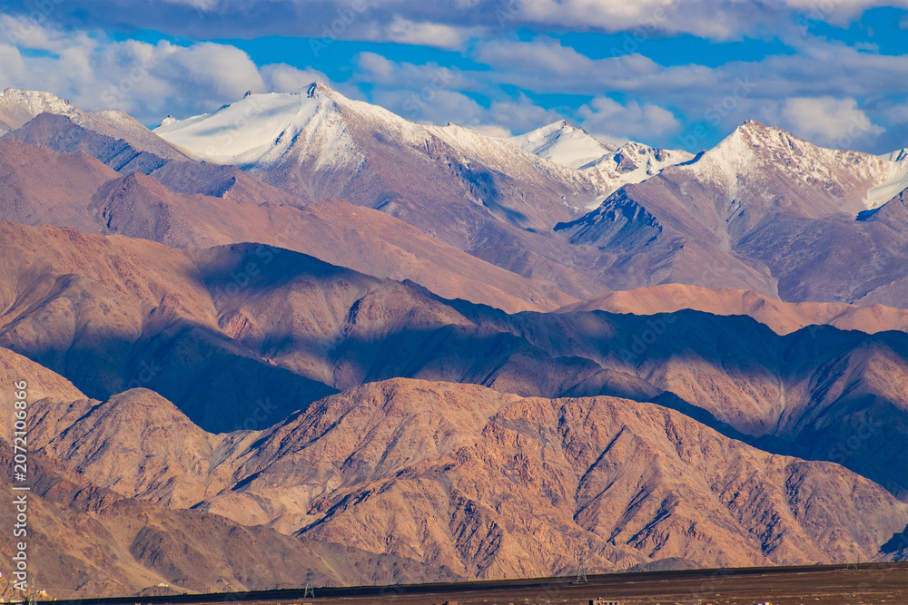 Obraz premium Scenic beauty of Himalayan mountains near Leh Airport, Ladakh, India. Leh is the capital of Ladakh, Jammu and Kashmir and known for natural landscape attracting tourist from all over India and world.