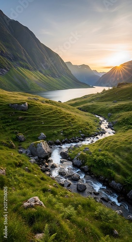 Serene mountain lake at sunset landscape.