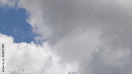 The cumulonimbus clouds is covered by the dark cloud
