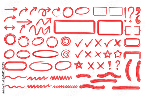 Foto Red hand drawn arrows and correction marks set isolated on white.