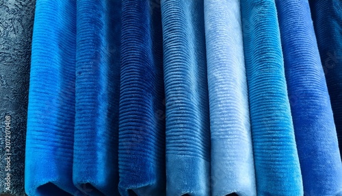 Velour Boucle And Chenille Fabric Samples Arranged In A Cold Blue Palette Colors