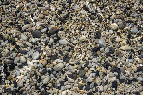 Canvas Print White, grey and black smooth river pebbles stones background, simplicity still l