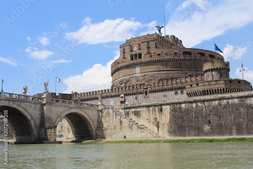 ROME, ITALY - JUNE 6, 2016: Castel Sant'Angelo and Ponte Sant'Angelo over the Tiber River under blue sky