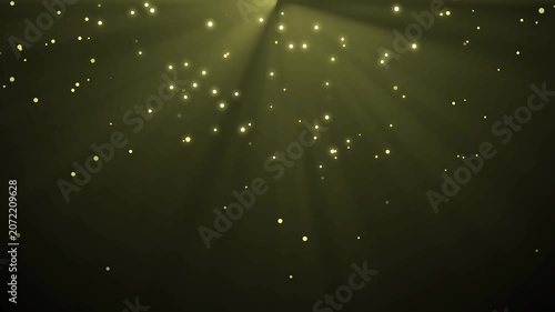 Scattered glowing particles and subtle light rays from above background animation
